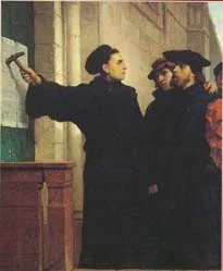 Uitbeelding van het verhaal dat Luther zijn "95 stellingen" op de deur van de slotkerk te Wittenberg gespijkerd zou hebben (Ferdinand Pauwels, 1872)