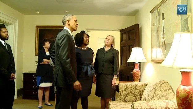 President Obama en Ruby Bridges bij het schilderij in het Witte Huis