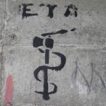 Symbool van de ETA op een muur in Spanje - Foto: CC/Joxemai