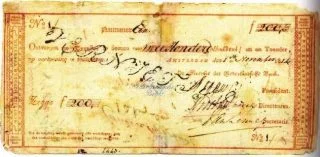 Het eerste Nederlandse bankbiljet ter waarde van 200 gulden, uitgegeven door de Nederlandsche Bank op 1 november 1814. Ontwerp door J. Enschedé en Zonen.