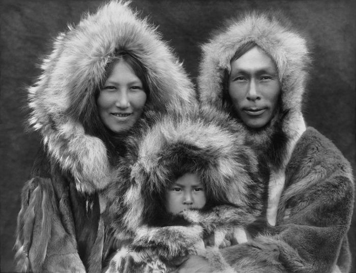 Eskimo mother, father, and son (1929)