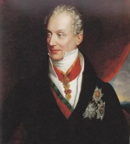 Prins Klemens Wenzel von Metternich (1773-1859), kanselier van Oostenrijk tot hij in 1848 op de vlucht werd gedreven, was één van de toonaangevende figuren in de eerste helft van de negentiende eeuw. Hij was er van overtuigd dat er een omvangrijke, mondiale samenzwering bestond met het doel in de gehele wereld tronen en altaren omver te werpen. Hij was vastbesloten deze samenzwering tot aan zijn dood te bestrijden met draconische tegenmaatregelen.