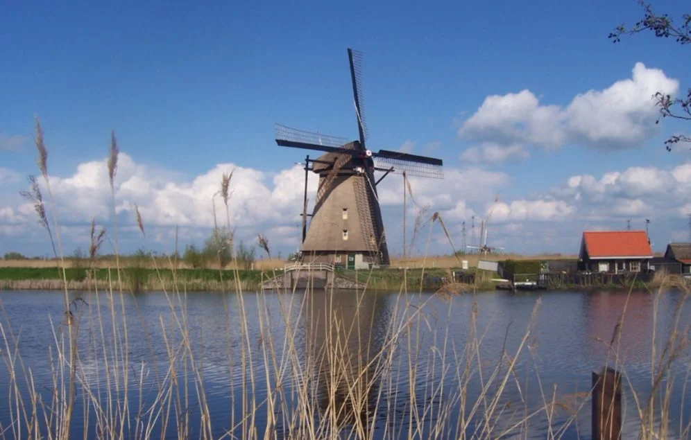 Lijst van Werelderfgoederen in Nederland (UNESCO) - Een van de negentien Kinderdijkse molens (cc)