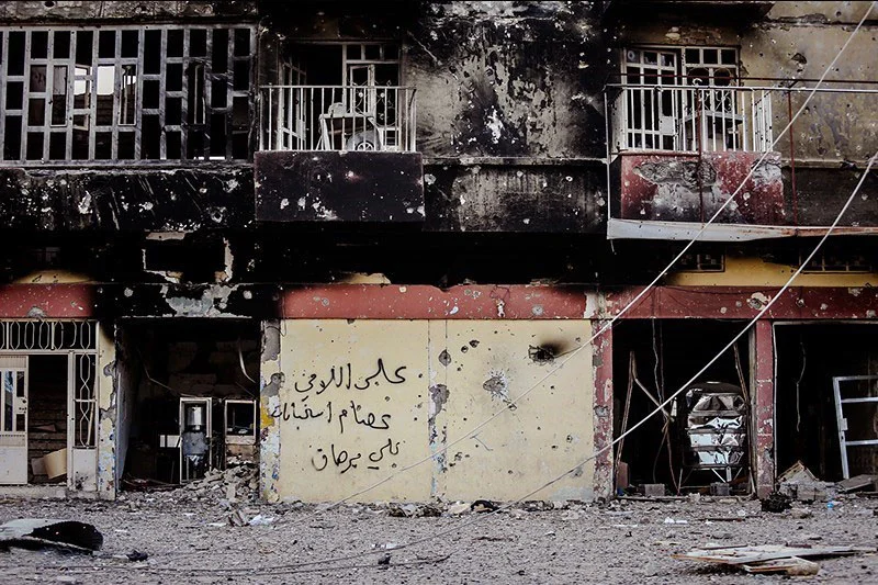 Graffiti op een muur in Fallujah - cc