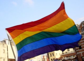 De regenboogvlag van de homobeweging - cc