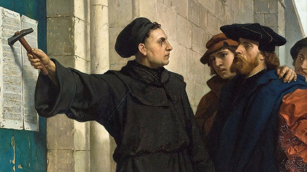 Ferdinand Pauwels, 1872. Maarten Luther spijkert de 95 stellingen op de deur van de slotkerk in Wittenberg, 31 oktober 1517. (wiki)