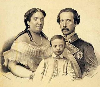 Alfons XII met zijn ouders