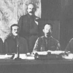 Leden van het presidium van de Tsjeka, 1921. Tweede van rechts: Dzerzjinski
