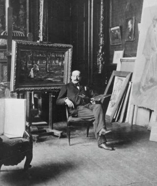 Max Liebermann in zijn atelier in Berlijn - Op de achtergrond het schilderij Naar school in Laren, 1898
