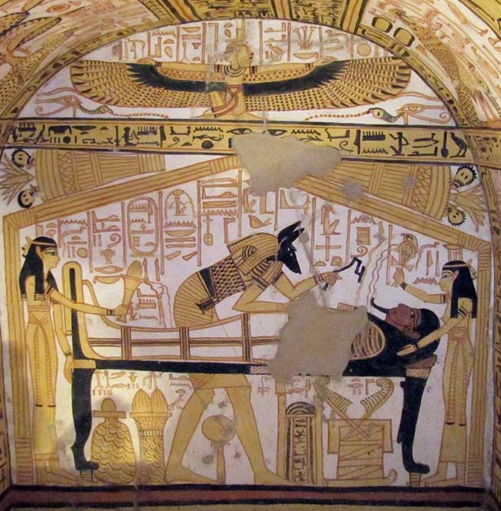 Anubis balsemt een dode terwijl Isis (links) en  Nephthys (rechts) toekijken, 133 eeuw voor Christus