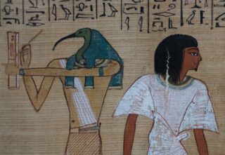 Thoth noteert het gewicht van het hart van een overledene tijdens het dodengericht - Detail van de papyrus van Hunefer