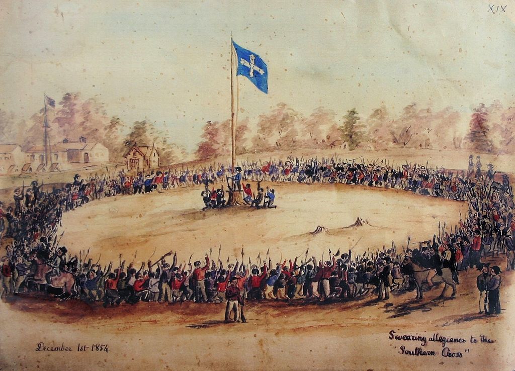 Op 30 november 1854 hijsen de gouddelvers van de Eureka-mijn in Ballarat de republikeinse vlag met het ‘Southern Cross’ om zich vervolgens achter een palissade te verschansen tegen de Britse troepen.