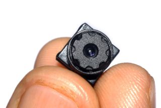 Lens van een hele kleine,geheime camera