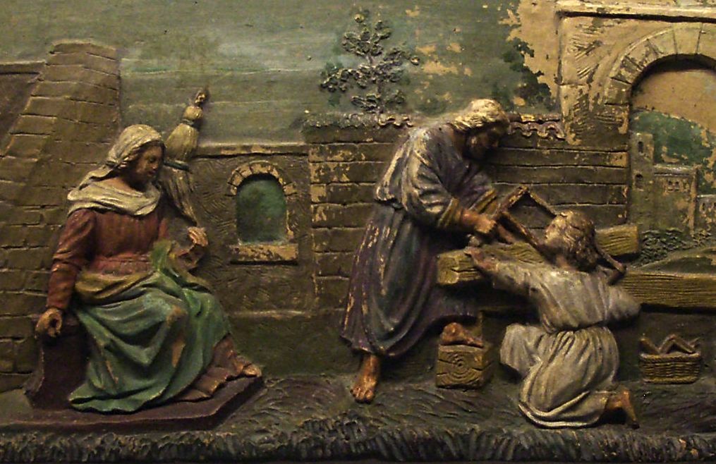 Jezus assisteert Jozef tijdens zijn werk met een zaag, terwijl Maria toekijkt