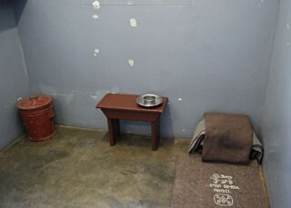 Mandela's cel op Robbeneiland