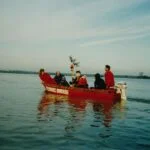 Reddingswerkers in 1993, tijdens hoog water in Limburg