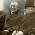 De Amerikaanse president Woodrow Wilson in 1918 tijdens een rondrit met de Franse president Raymond Poincaré