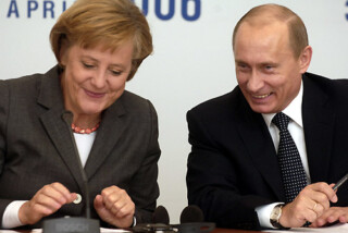 Bondskanselier Angela Merkel en president van Rusland Vladimir Poetin tijdens een bezoek aan Tomsk, 2006.