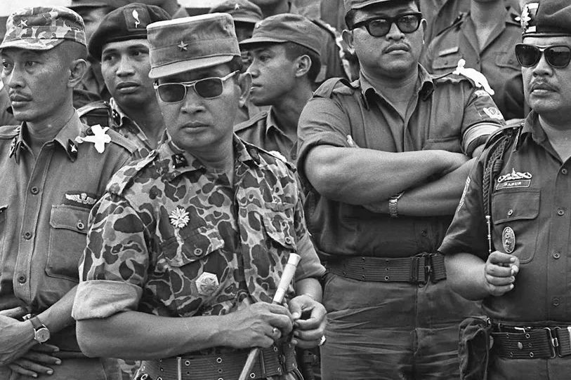 Soeharto (in camouflage-uniform)