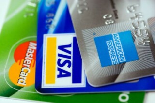 Drie creditcards, Mastercard, Visa & American Express