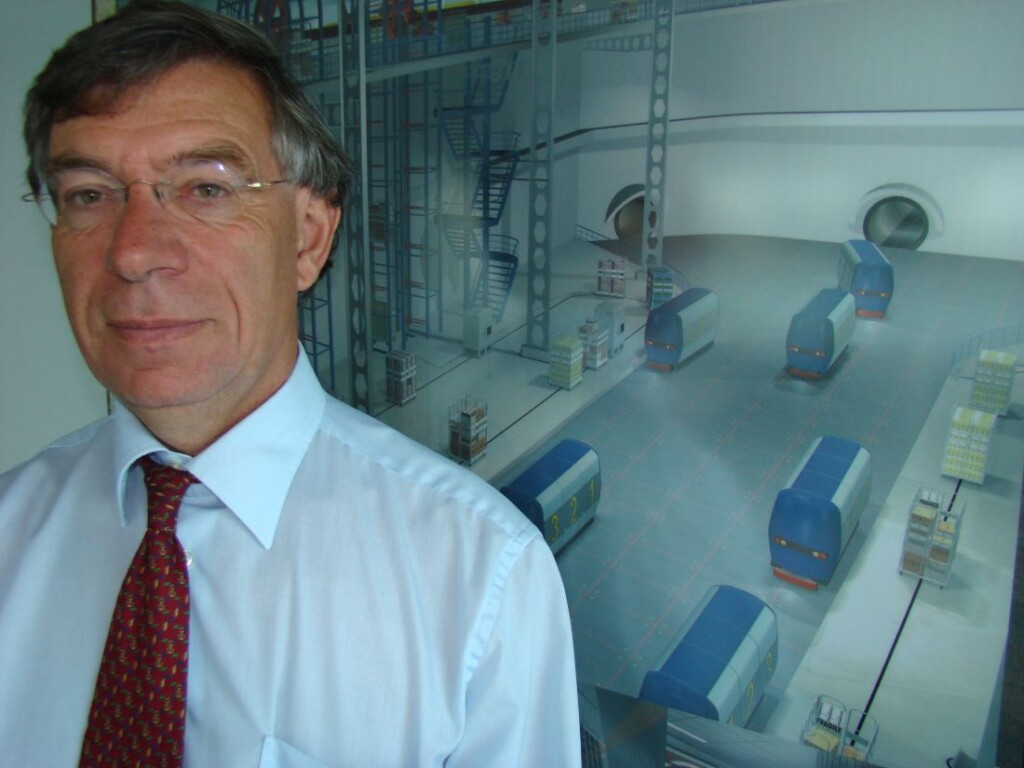 Drs. J. Katgerman voor een artist impression van guided vehicles